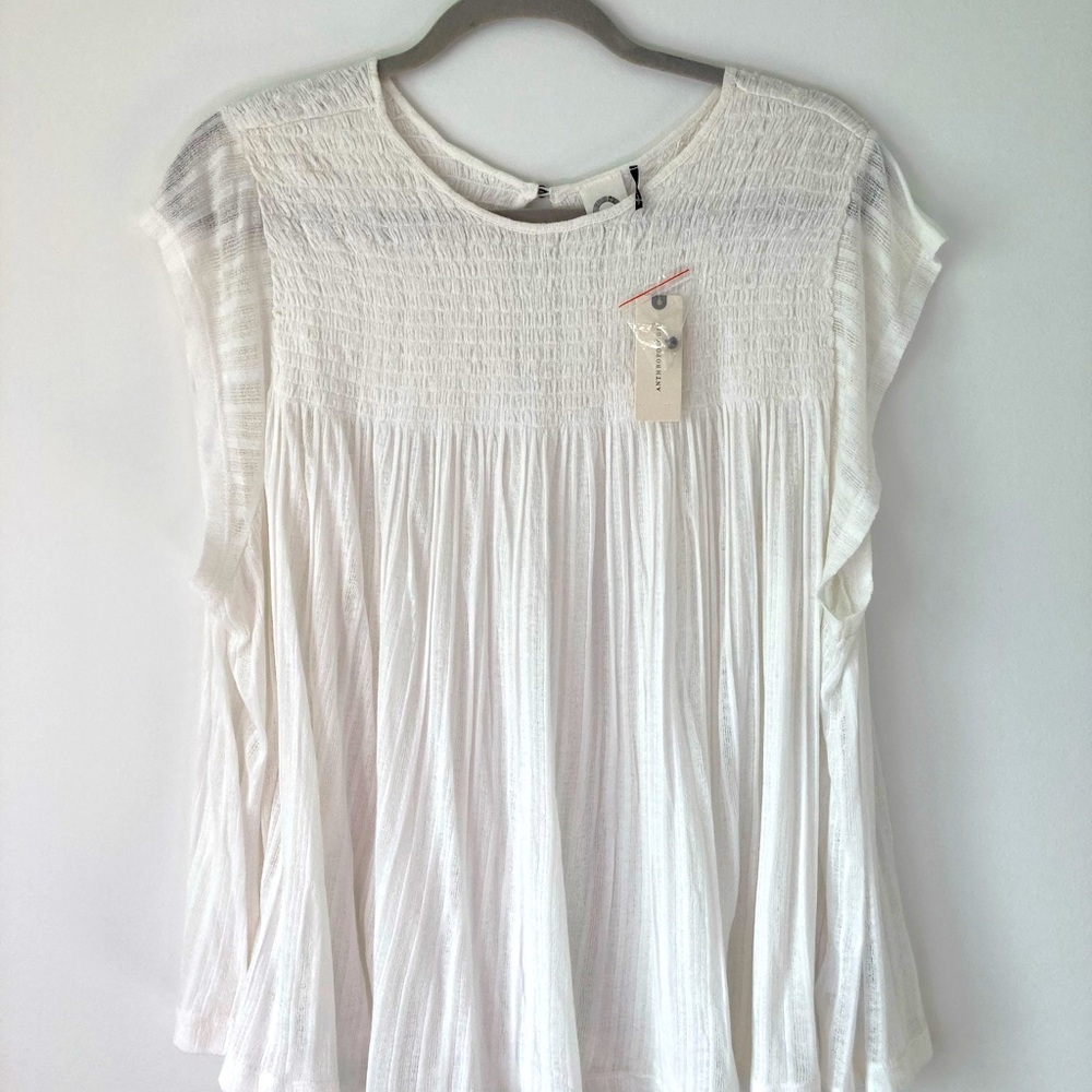 NWT medium size Akemi + Kin blouse from Anthropologie.